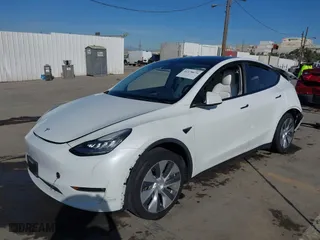 2021 Tesla Model Y Standard Range with VIN 5YJYGDED4MF162982, listed as a IAAI auction lot 41378674 with 60,267 mi miles. Bid and sale history available at carsss.com. Image 19.
