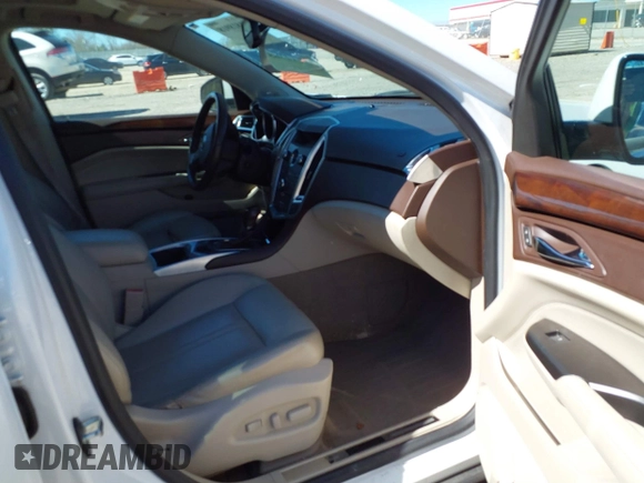 2012 Cadillac SRX Performance Collection with VIN 3GYFNBE33CS614655, listed as a IAAI auction lot 41818918 with 176,899 mi miles. Bid and sale history available at carsss.com. Image 5.