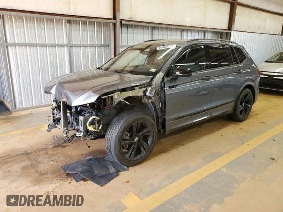 2023 Volkswagen Tiguan SE R-Line Black with VIN 3VV8B7AX6PM101974, listed as a Copart auction lot 60465795 with 29,464 mi miles and Salvage title. Bid and sale history available at DreamBid. Image 1.