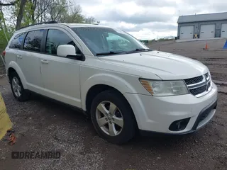 2011 Dodge Journey Mainstreet with VIN 3D4PG1FG9BT544137, listed as a IAAI auction lot 42072661 with 156,015 mi miles and . Bid and sale history available at DreamBid. Image 1.