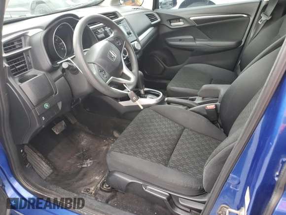 2015 Honda Fit LX with VIN 3HGGK5H50FM726275, listed as a Copart auction lot 56564315 with 123,082 mi miles and Salvage title. Bid and sale history available at DreamBid. Image 7.