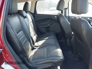 2016 Ford Escape Titanium with VIN 1FMCU0J93GUB01191, listed as a IAAI auction lot 41824183 with 97,241 mi miles. Bid and sale history available at carsss.com. Image 8.