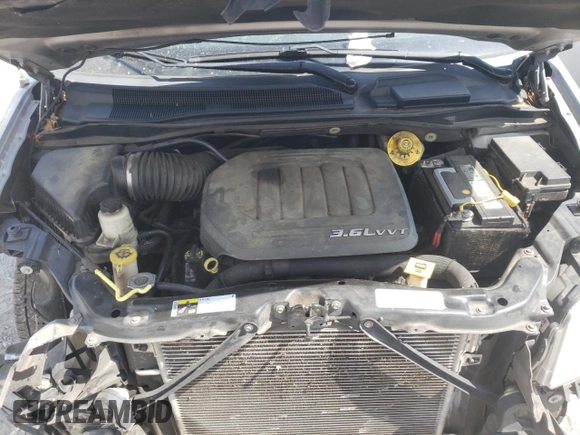 2013 Chrysler Town & Country Touring with VIN 2C4RC1BG7DR778001, listed as a Copart auction lot 51655184 with 181,861 mi miles and Salvage Title. Bid and sale history available at DreamBid. Image 12.