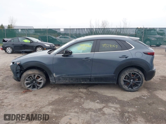 2024 Mazda CX-30 S Preferred with VIN 3MVDMBCM2RM618042, listed as a IAAI auction lot 41929064 with 15,106 mi miles and . Bid and sale history available at DreamBid. Image 14.