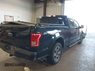 2015 Ford F-150 XLT with VIN 1FTFW1EF3FKD51350, listed as a IAAI auction lot 41413942 with 125,877 mi miles and . Bid and sale history available at carsss.com. Image 4.