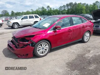 2016 Ford Focus Titanium with VIN 1FADP3J22GL314021, listed as a IAAI auction lot 42212462 with 142,370 mi miles and . Bid and sale history available at DreamBid. Image 2.