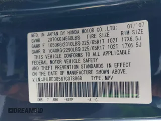 2007 Honda CR-V EX with VIN JHLRE38567C078868, listed as a IAAI auction lot 41962333 with 202,342 mi miles and . Bid and sale history available at carsss.com. Image 9.