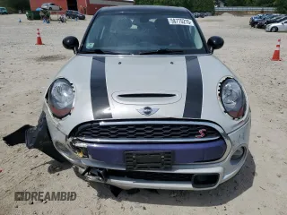 2015 MINI Hardtop 4 Door S with VIN WMWXU3C5XF2B56555, listed as a Copart auction lot 58775215 with 101,426 mi miles and Clean title. Bid and sale history available at DreamBid. Image 5.