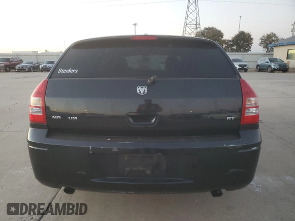 2005 Dodge Magnum RT z VIN 2D8GV58275H637166, wystawiony jako Copart lot #76593864 z przebiegiem 113 341 mil mil oraz Szkoda całkowita • Salvage title. Historia ofert i sprzedaży dostępna na DreamBid. Obrazek 6.