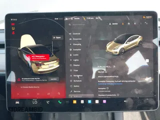 2023 Tesla Model 3 with VIN 5YJ3E1EA4PF427022, listed as a IAAI auction lot 42465964 with 169,346 mi miles and . Bid and sale history available at DreamBid. Image 7.