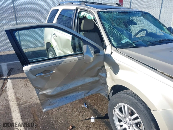 2011 Mercury Mariner Premier with VIN 4M2CN9HG4BKJ05985, listed as a IAAI auction lot 41132168 with 84,031 mi miles. Bid and sale history available at carsss.com. Image 12.