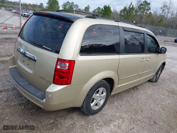 2010 Dodge Grand Caravan SXT with VIN 2D4RN5DX5AR290131, listed as a IAAI auction lot 41314452 with 194,819 mi miles. Bid and sale history available at carsss.com. Image 4.