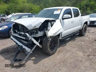 2021 Toyota Tacoma 4WD SR with VIN 3TMCZ5AN2MM414975, listed as a IAAI auction lot 41997227 with 57,729 mi miles. Bid and sale history available at carsss.com. Image 17.