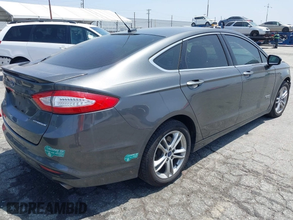 2016 Ford Fusion Titanium with VIN 3FA6P0SU1GR304590, listed as a IAAI auction lot 42381545 with 136,684 mi miles and . Bid and sale history available at DreamBid. Image 4.