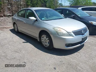 2009 Nissan Altima S z VIN 1N4AL21EX9N479387, wystawiony jako IAAI lot #42423946 z przebiegiem 167 224 mil mil oraz . Historia ofert i sprzedaży dostępna na DreamBid. Obrazek 1.