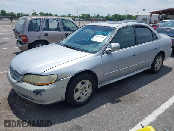 2001 Honda Accord EX z VIN 1HGCG165X1A058857, wystawiony jako IAAI lot #39264541 z przebiegiem 184 645 mil mil oraz . Historia ofert i sprzedaży dostępna na DreamBid. Obrazek 2.