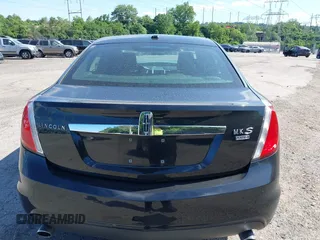 2009 Lincoln MKS z VIN 1LNHM94R99G626277, wystawiony jako IAAI lot #42300926 z przebiegiem Nie podano mil oraz . Historia ofert i sprzedaży dostępna na DreamBid. Obrazek 17.