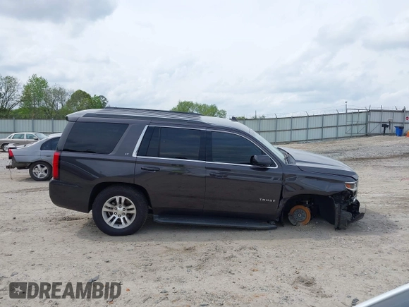 2018 Chevrolet Tahoe LT with VIN 1GNSKBKCXJR103730, listed as a IAAI auction lot 42125208 with 212,360 mi miles and . Bid and sale history available at DreamBid. Image 13.