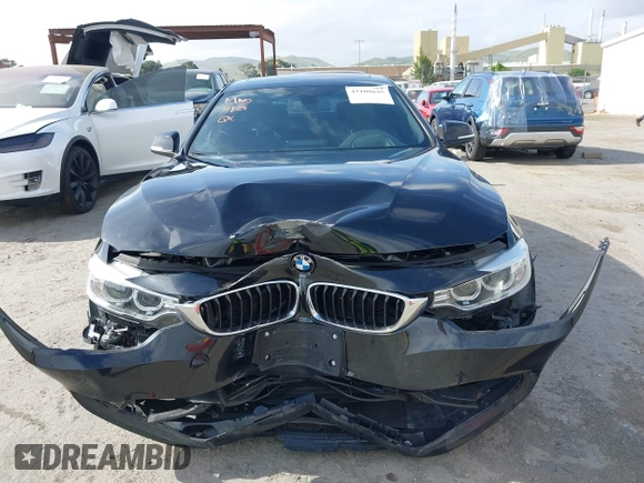 2015 BMW 4 Series 428i z VIN WBA4A9C5XFD416873, wystawiony jako IAAI lot #42108645 z przebiegiem 93 433 mil mil oraz . Historia ofert i sprzedaży dostępna na DreamBid. Obrazek 13.