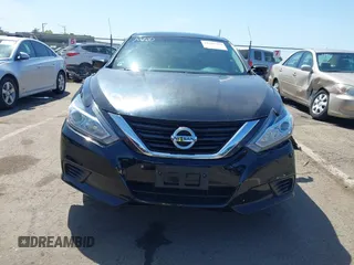 2018 Nissan Altima S with VIN 1N4AL3AP9JC191111, listed as a IAAI auction lot 42104769 with 84,914 mi miles and . Bid and sale history available at DreamBid. Image 12.