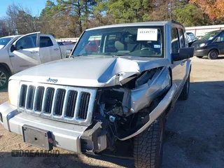 2007 Jeep Commander Sport z VIN 1J8HH48K77C587615, wystawiony jako IAAI lot #41149777 z przebiegiem 167 871 mil mil oraz . Historia ofert i sprzedaży dostępna na DreamBid. Obrazek 6.