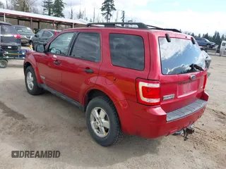 2008 Ford Escape XLT with VIN 1FMCU93168KE53335, listed as a IAAI auction lot 41935885 with 241,723 mi miles. Bid and sale history available at carsss.com. Image 3.