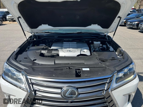 2016 Lexus LX 570 with VIN JTJHY7AX8G4198794, listed as a Copart auction lot 54615015 with 107,196 mi miles and Clean Title. Bid and sale history available at DreamBid. Image 8.