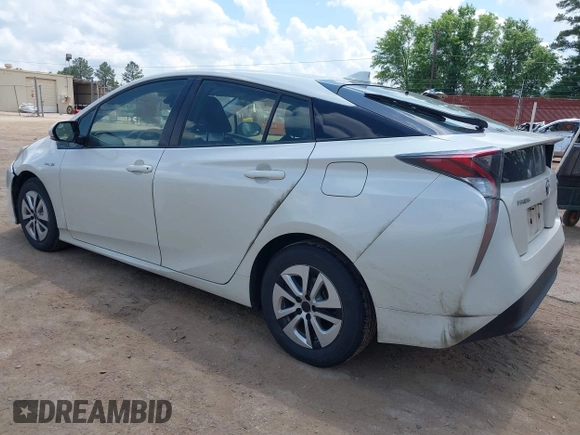 2017 Toyota Prius Two with VIN JTDKARFUXH3040780, listed as a IAAI auction lot 42091493 with 105,952 mi miles and . Bid and sale history available at DreamBid. Image 3.