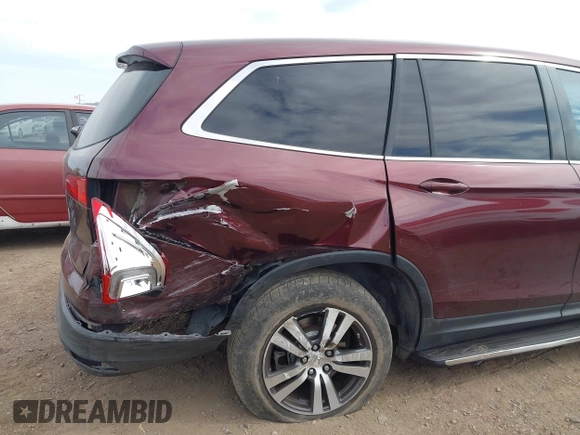 2016 Honda Pilot EX-L with VIN 5FNYF5H57GB028307, listed as a IAAI auction lot 41925711 with 125,118 mi miles and . Bid and sale history available at DreamBid. Image 6.