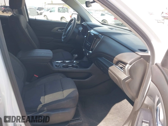 2020 Chevrolet Traverse LS with VIN 1GNERFKW0LJ303818, listed as a IAAI auction lot 42170427 with 67,517 mi miles and . Bid and sale history available at DreamBid. Image 5.
