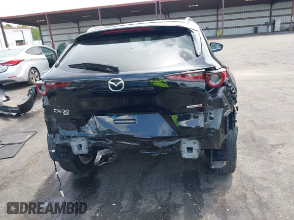 2023 Mazda CX-30 S Carbon Edition с VIN 3MVDMBCM7PM549197, выставлен на аукционе IAAI как лот 42224977 с пробегом 22 201 миль миль и . История ставок и продаж доступна на DreamBid. Изображение 16.