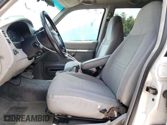 2001 Ford Explorer XLS with VIN 1FMZU72E11ZA76025, listed as a Copart auction lot 61963445 with 266,687 mi miles and Salvage title. Bid and sale history available at DreamBid. Image 7.