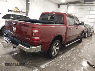 2020 Ram 1500 Laramie z VIN 1C6SRFJT5LN109384, wystawiony jako IAAI lot #42290125 z przebiegiem 73 629 mil mil oraz . Historia ofert i sprzedaży dostępna na DreamBid. Obrazek 4.