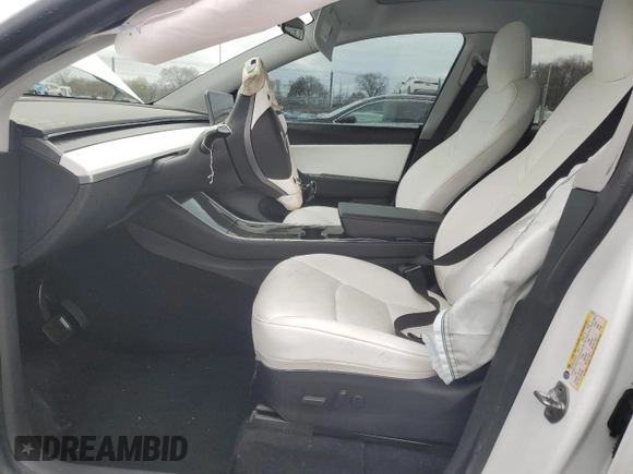 2020 Tesla Model Y Long Range with VIN 5YJYGDEE2LF019133, listed as a Copart auction lot 51773455 with 26,122 mi miles and Salvage Title. Bid and sale history available at DreamBid. Image 7.