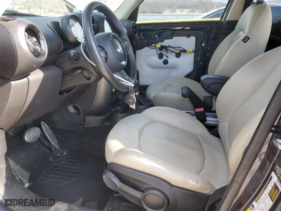 2014 MINI Cooper Countryman S with VIN WMWZC3C5XEWP25131, listed as a Copart auction lot 42112515 with 90,513 mi miles and Salvage Title. Bid and sale history available at carsss.com. Image 7.