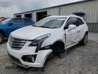 2020 Cadillac XT5 Premium Luxury FWD z VIN 1GYKNCRS5LZ229686, wystawiony jako Copart lot #57391915 z przebiegiem 54 491 mil mil oraz Szkoda całkowita • Salvage title. Historia ofert i sprzedaży dostępna na DreamBid. Obrazek 1.