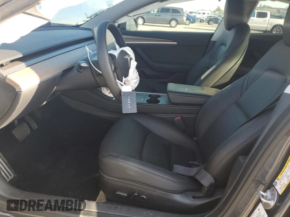 2023 Tesla Model 3 with VIN 5YJ3E1EA9PF714646, listed as a Copart auction lot 51551455 with 29,611 mi miles and Salvage Title. Bid and sale history available at DreamBid. Image 7.