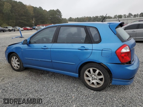2005 Kia Spectra with VIN KNAFE161955108612, listed as a Copart auction lot 79648514 with 156,963 mi miles and Salvage Title. Bid and sale history available at carsss.com. Image 2.