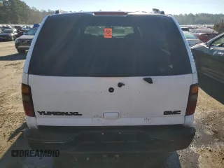2002 GMC Yukon XL SLT with VIN 1GKEC16ZX2J121564, listed as a Copart auction lot 76110464 with 0 mi miles and Salvage Title. Bid and sale history available at carsss.com. Image 6.