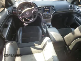 2018 Jeep Grand Cherokee Altitude with VIN 1C4RJFAGXJC296051, listed as a Copart auction lot 53450135 with 65,838 mi miles and Salvage title. Bid and sale history available at DreamBid. Image 8.