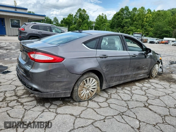 2013 Ford Fusion SE Hybrid with VIN 3FA6P0LU2DR329816, listed as a Copart auction lot 64308255 with 217,157 mi miles and Salvage title. Bid and sale history available at DreamBid. Image 3.