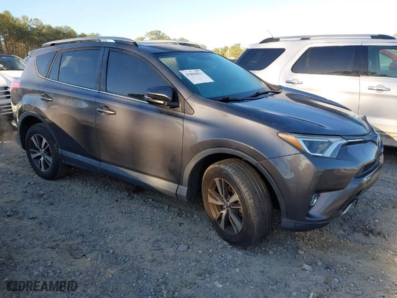 2016 Toyota RAV4 XLE with VIN 2T3WFREV0GW266691, listed as a IAAI auction lot 41804023 with 77,000 mi miles. Bid and sale history available at carsss.com. Image 1.