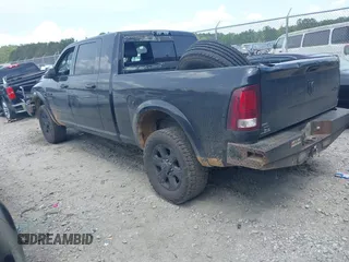 2018 Ram 2500 Laramie with VIN 3C6UR5NLXJG256688, listed as a IAAI auction lot 42168537 with 214,596 mi miles and . Bid and sale history available at DreamBid. Image 3.