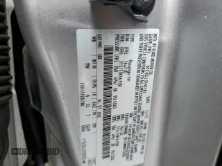 2016 Ford Focus SE with VIN 1FADP3FE5GL233081, listed as a Copart auction lot 65498195 with 89,674 mi miles and Salvage title. Bid and sale history available at DreamBid. Image 12.