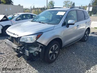 2018 Subaru Forester Premium with VIN JF2SJAGC6JH585182, listed as a IAAI auction lot 42043236 with 64,420 mi miles. Bid and sale history available at carsss.com. Image 2.