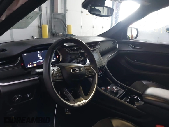 2023 Jeep Grand Cherokee Laredo with VIN 1C4RJHAG2PC640895, listed as a IAAI auction lot 41948963 with 45,500 mi miles and . Bid and sale history available at DreamBid. Image 18.