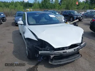 2021 Tesla Model S Long Range with VIN 5YJSA1E57MF428512, listed as a IAAI auction lot 42511020 with 29,611 mi miles and . Bid and sale history available at DreamBid. Image 12.