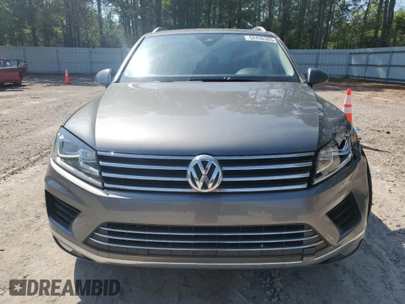 2016 Volkswagen Touareg Sport с VIN WVGEF9BP1GD012594, выставлен на аукционе Copart как лот 52438305 с пробегом 125 204 миль миль и Списание • Salvage title. История ставок и продаж доступна на DreamBid. Изображение 5.