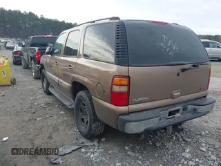 2003 GMC Yukon SLT with VIN 1GKEC13T73R126739, listed as a IAAI auction lot 41361906 with 166,748 mi miles. Bid and sale history available at carsss.com. Image 3.
