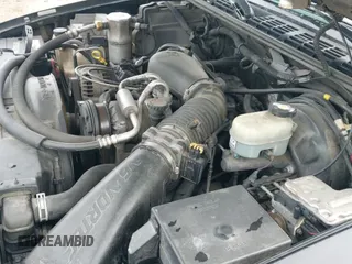 2002 Chevrolet Blazer LS z VIN 1GNDT13W92K170614, wystawiony jako IAAI lot #41745723 z przebiegiem 119 571 mil mil oraz . Historia ofert i sprzedaży dostępna na DreamBid. Obrazek 23.